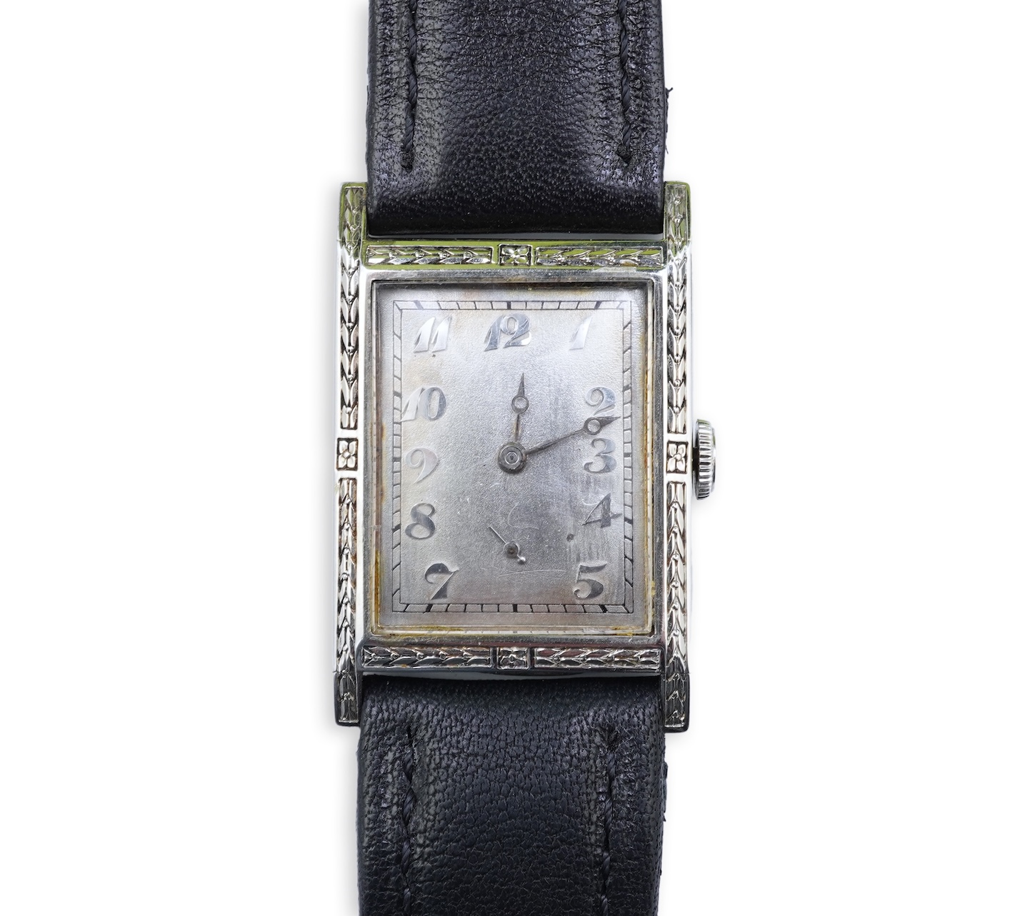 A lady's 18k white gold International Watch Company manual wind wrist watch, on a later associated leather strap